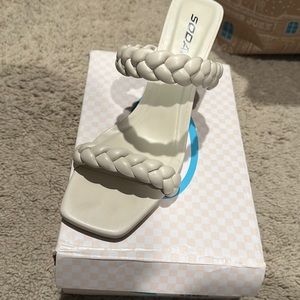 Ivory braided strap heels
